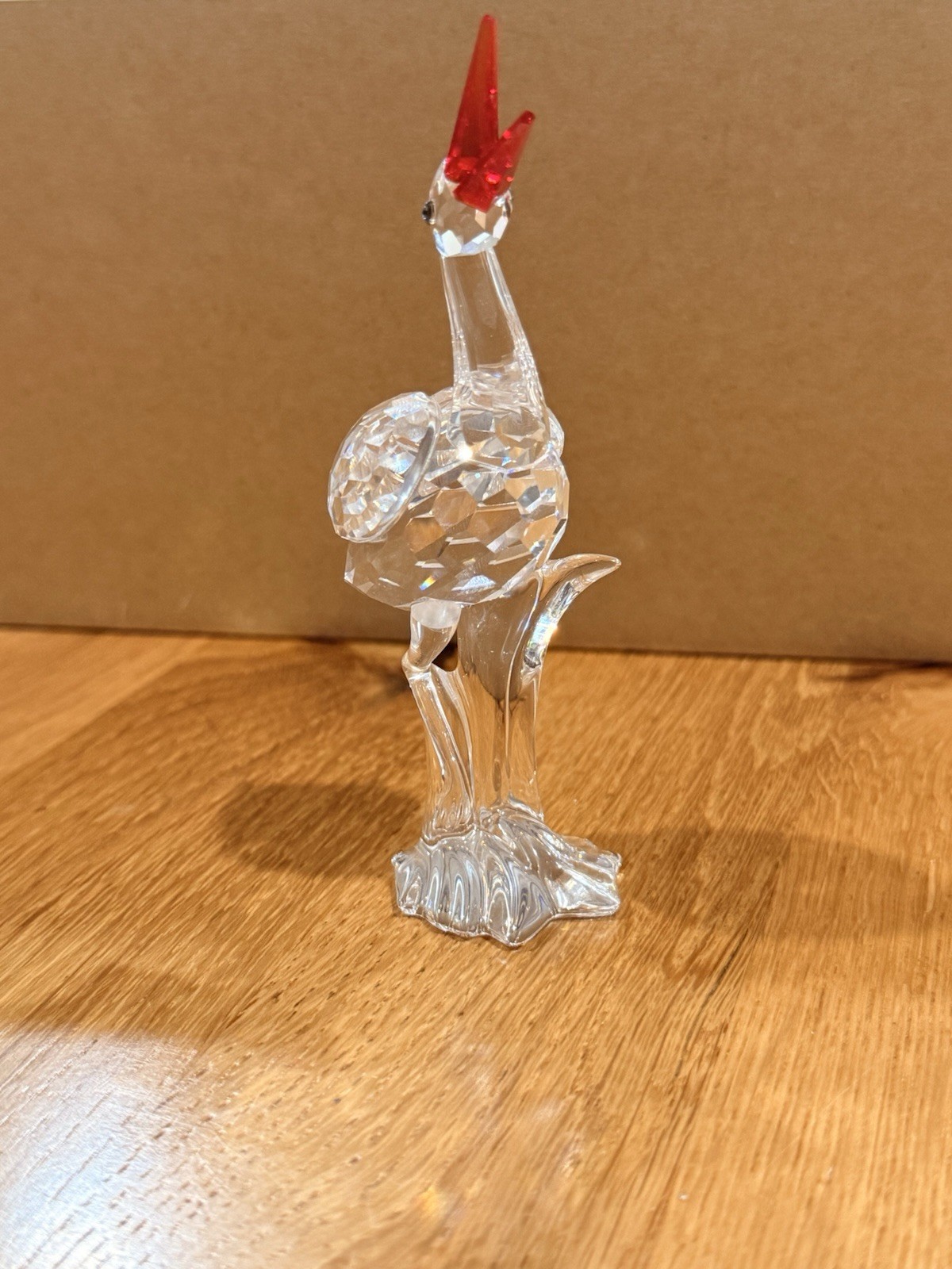 Swarovski crystal wading bird/crane-type figure with a red faceted crest