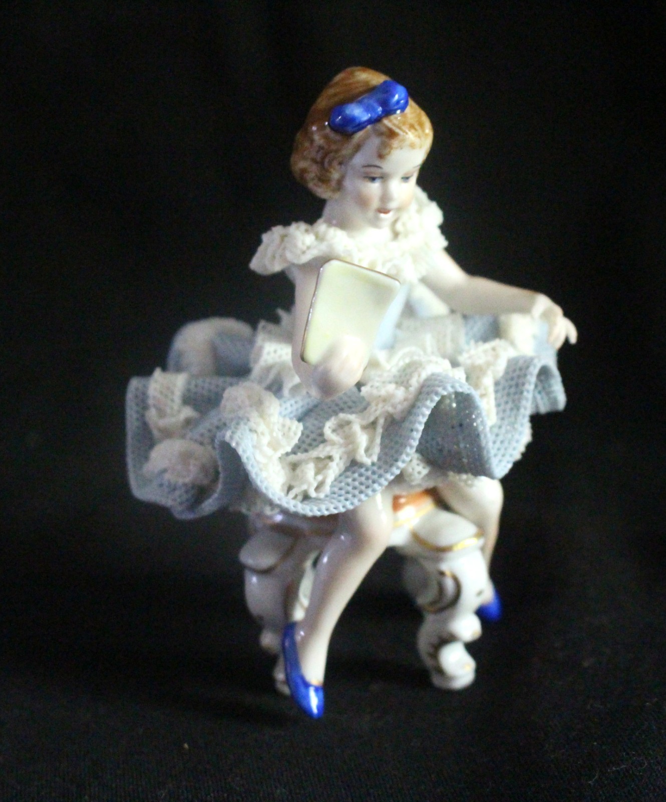 DRESDEN GIRL FIGURINE SITTING ON CHAIR