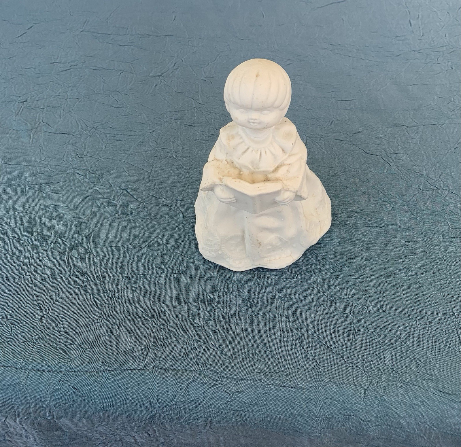 White ceramic unpainted reading / ￼ Caroling child. Chrustmas craft vintage