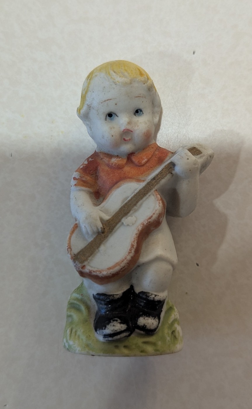 Ceramic Figurine Hand Painted Multicolor – Child Playing Guitar Sculpture