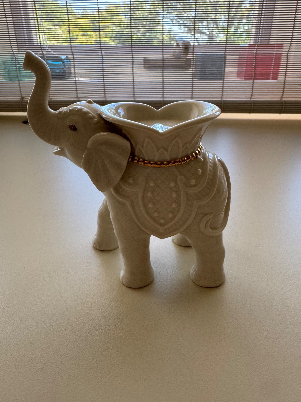 Lenox porcelain trio of animal figurines Elephant gold trim and 2 swans.
