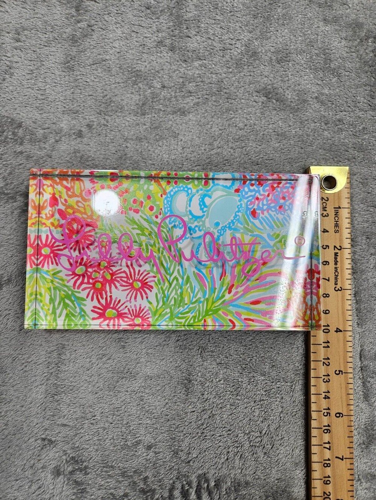 Lilly Pulitzer branded acrylic desk block featuring the Lovers Coral print.