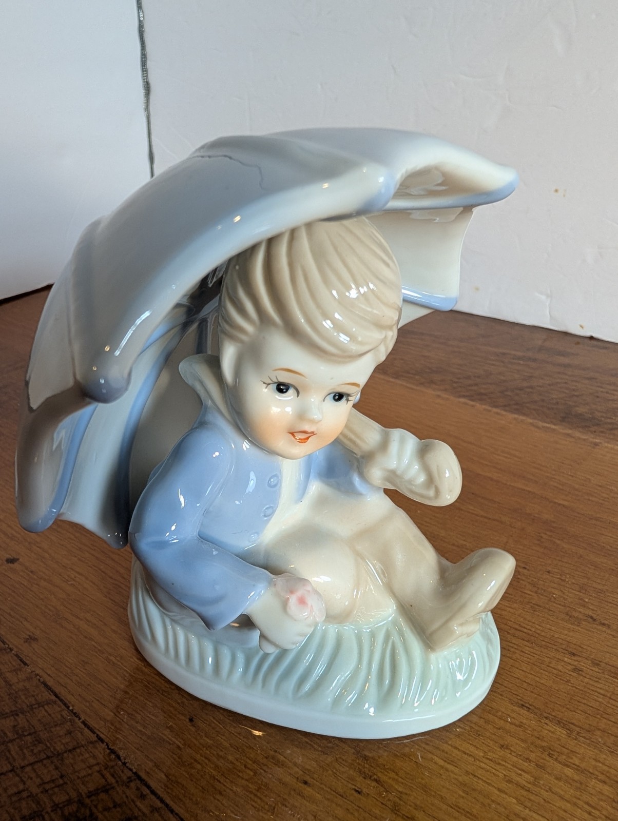Duncan Royale Fine Porcelain Boy Sitting Under Large Umbrella