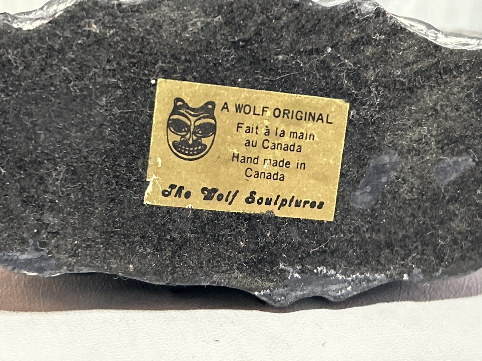 WOLF ORIGINAL SALMON SOAPSTONE FIGURINE, SIGNED WE, HAND MADE IN CANADA