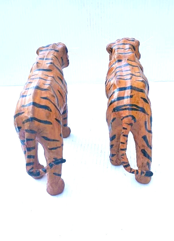 Pair of Mid-Century Leather Wrapped Paper Mache Snarling Tiger With Glass Eyes