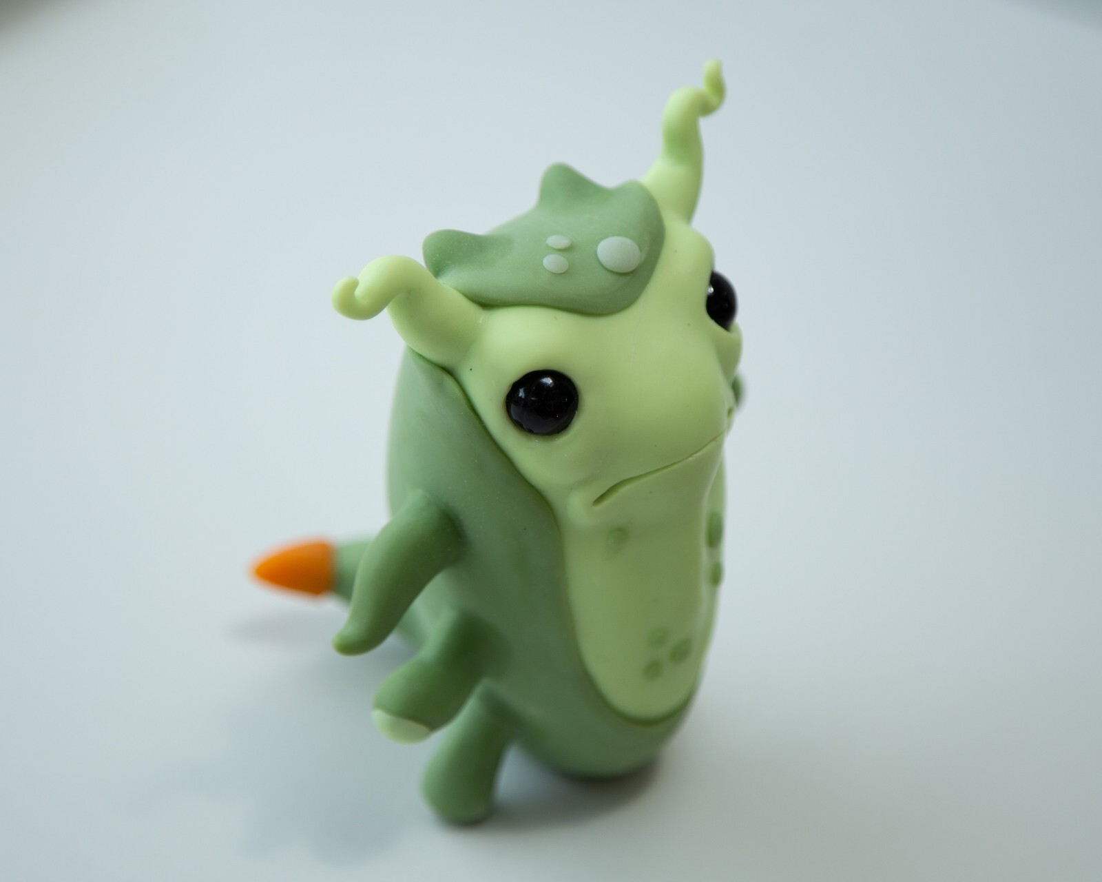 Cool and weird Germ Microbe figurine in anime style, polymer clay creature doll