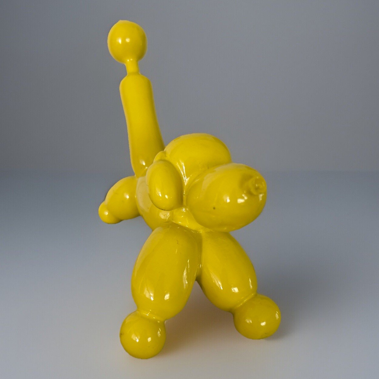 THREE HAND CORP RESIN BALLOON DOG FIGURINE IN ORANGE 6,5”