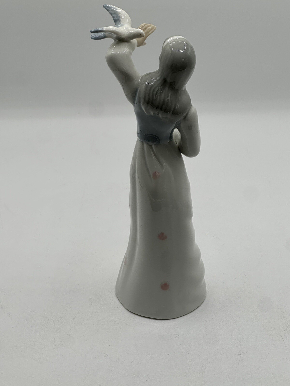 Tengra Female Figurine with Bird on Her Arm