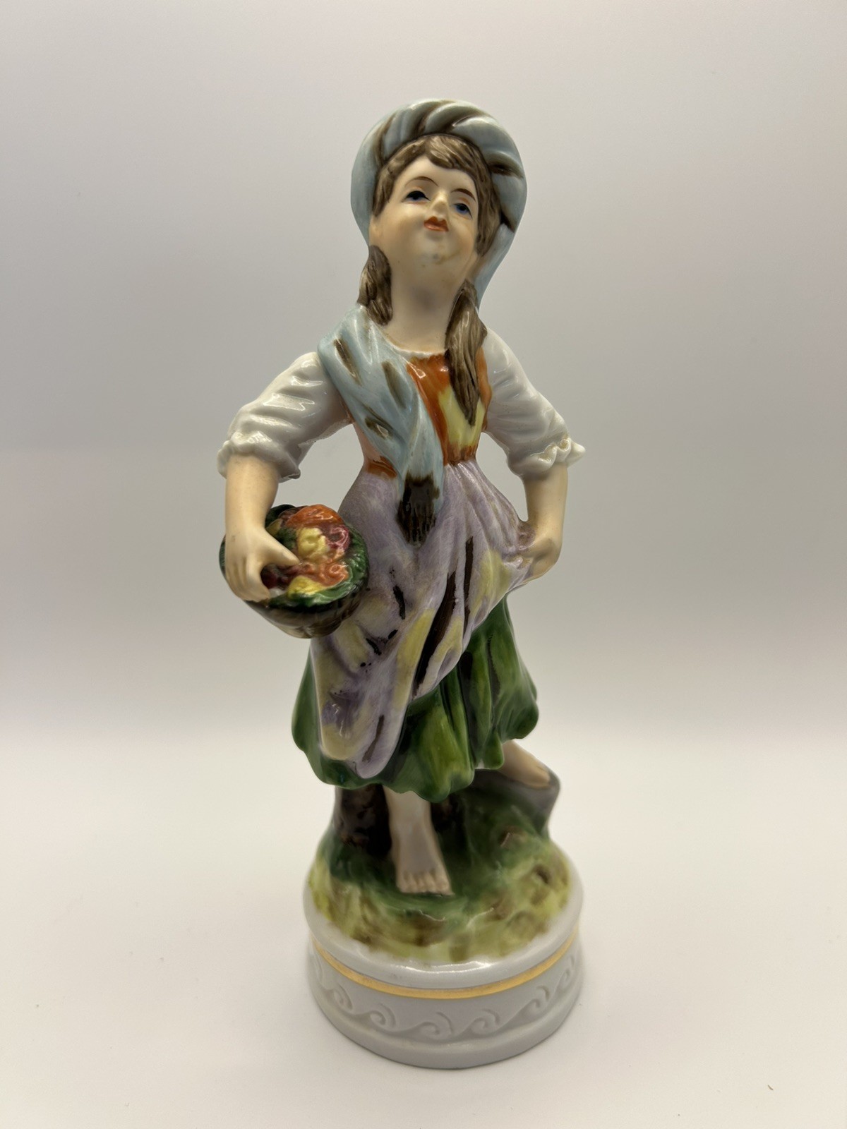 Vintage Porcelain Girl Figurine with a fruit basket Hand Painted Made in Korea