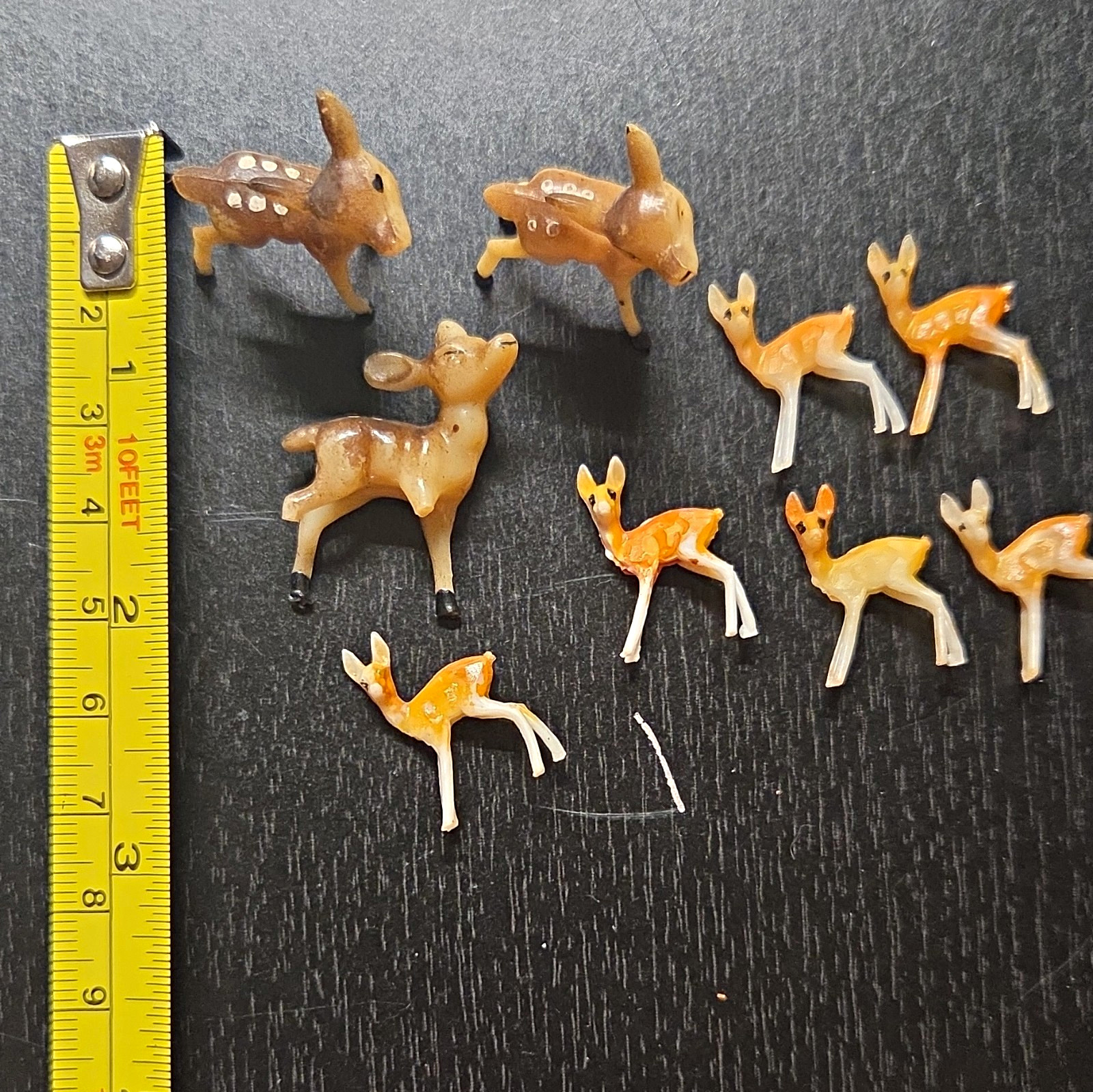 Lot of 9 Miniature Hand Painted Plastic or Celluloid Deer Figurines 1950s-1960s.
