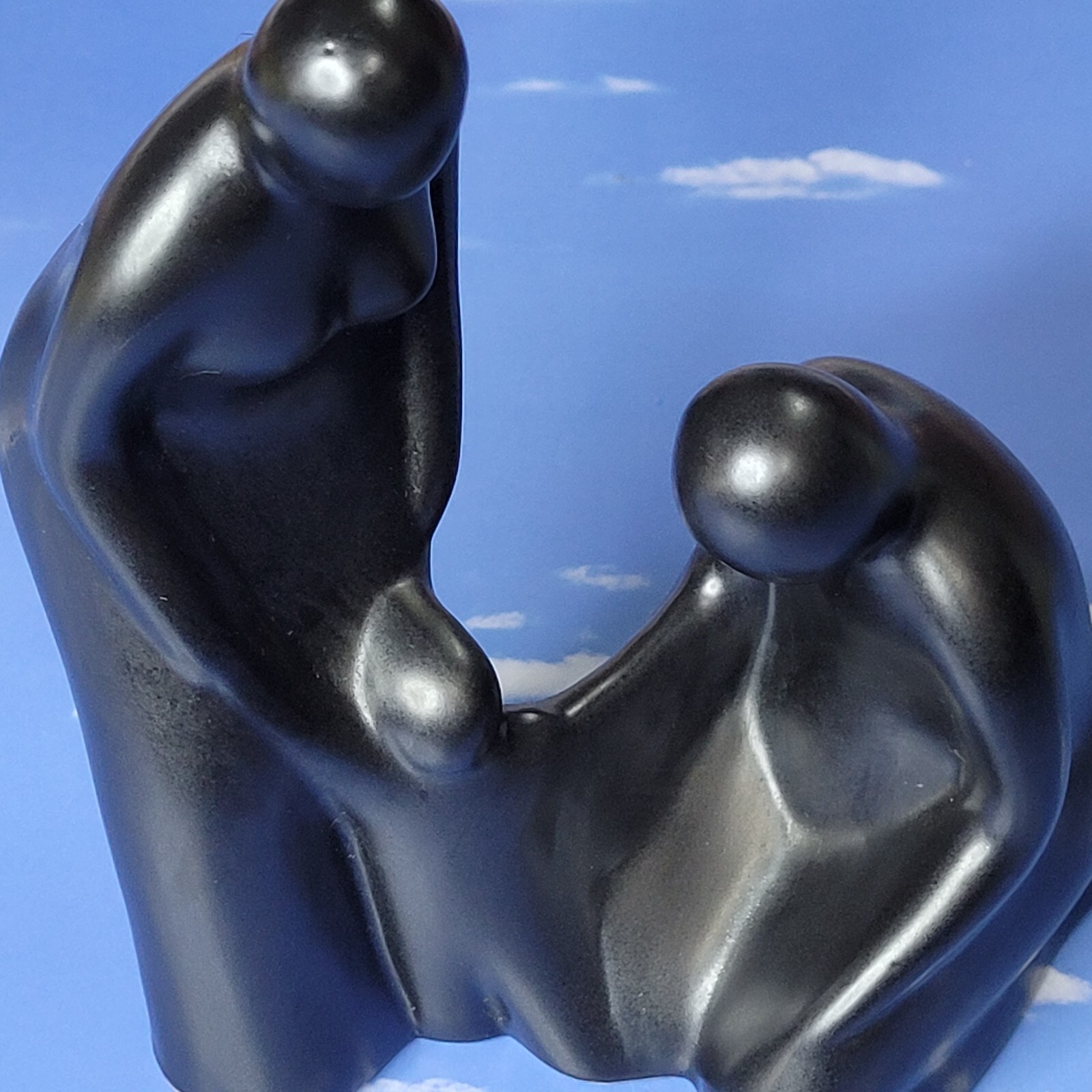 Embracing family ceramic figurine good condition very interesting scene.