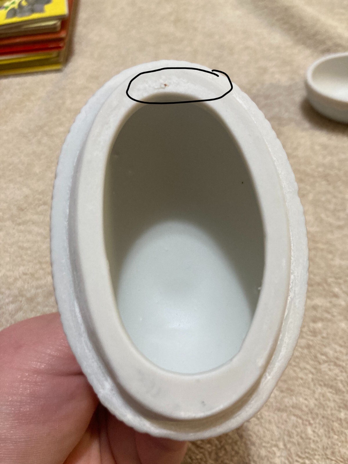 White Rabbit Holding onto Yellow +Green Egg 2 piece Egg that is Blue (Flawed)