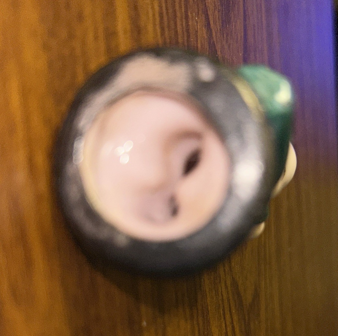 Vintage Porcelain Baby Pulling Cork From Bottle Figure