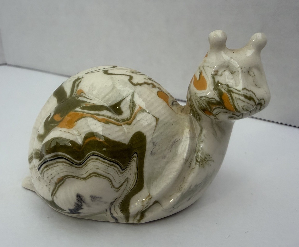 VINTAGE MINIATURE SNAIL FIGURINE GLAZE CREAMY WHITE ORANGE GREEN approx 2.5×1.5”