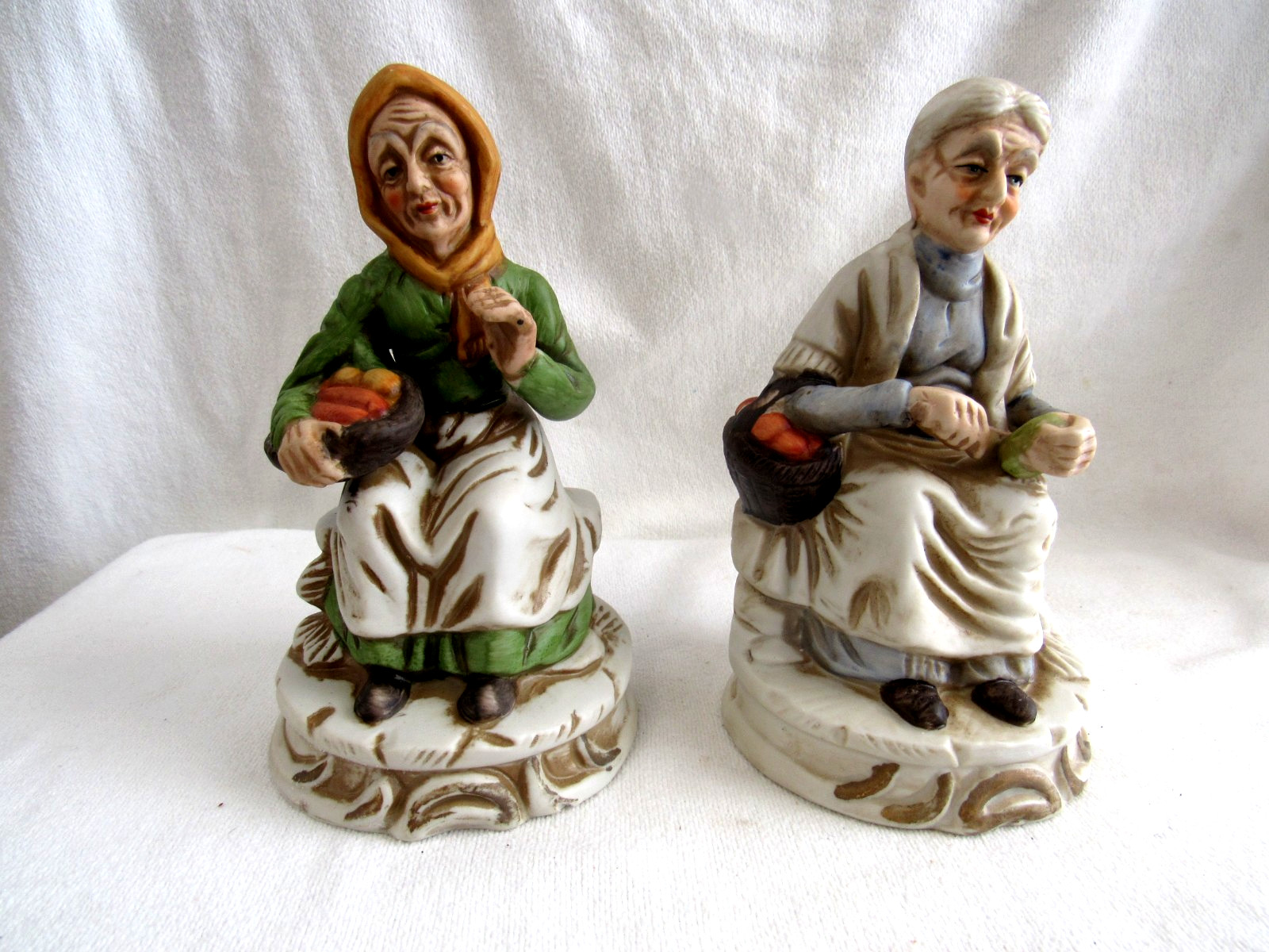 2 Old Women Sitting Holding Vegetable Baskets Figurines