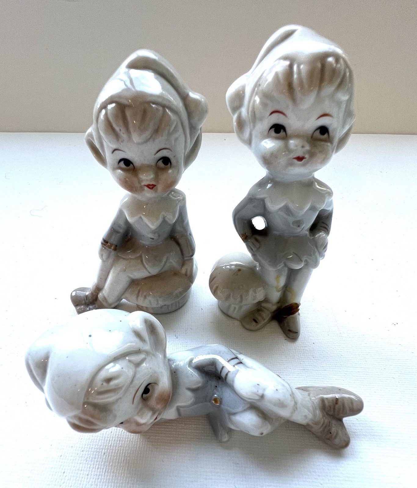 3 Pixies Porcelain Pale, Gray/blue One Damaged