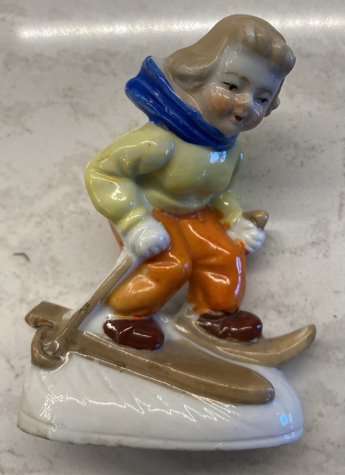4 Skier Figurines: 1 Napco Planter, 1 “Made In Occupied Japan”, 2 Marked “Japan”