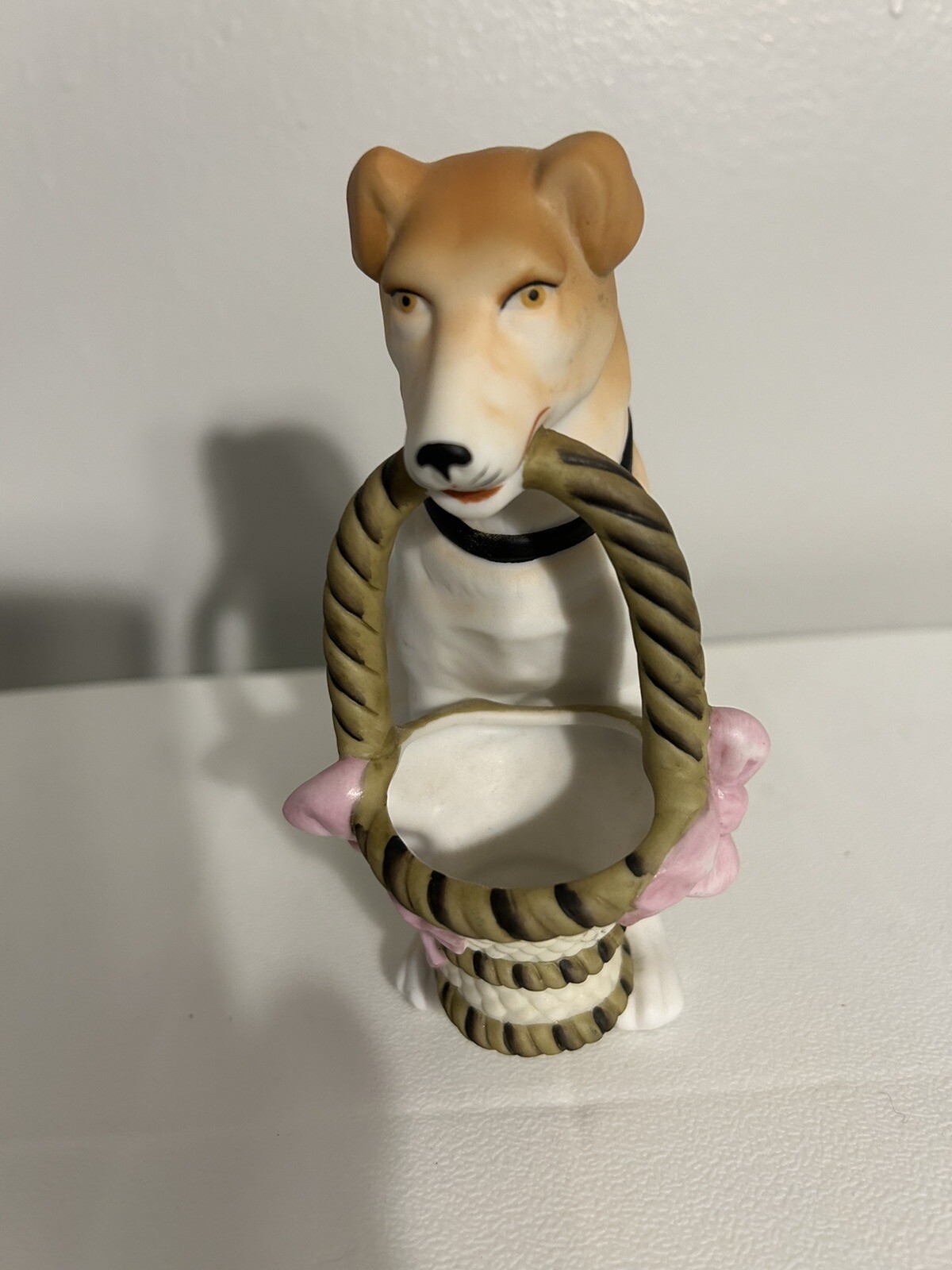 A Breed Apart Porcelain Dog Figurine Carrying An Easter Basket