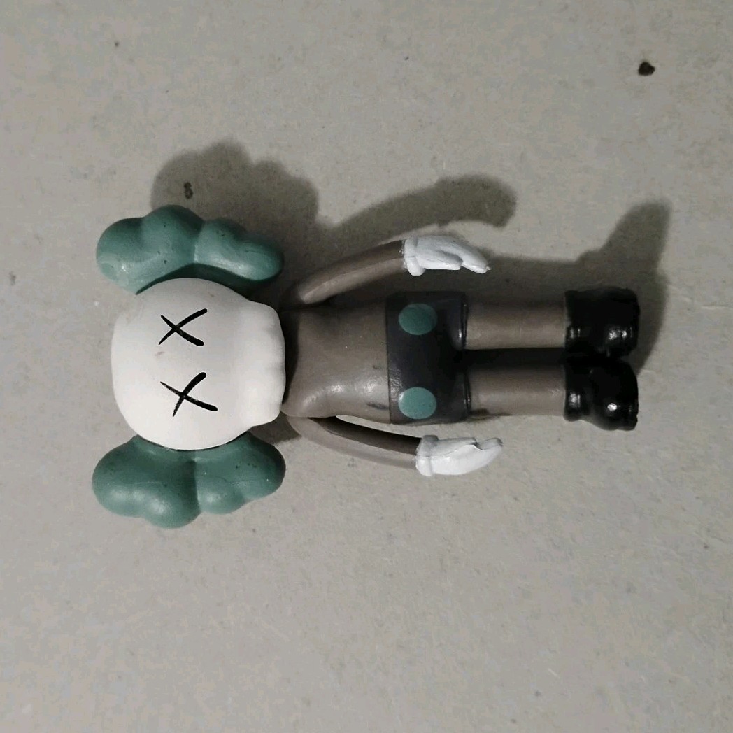 Gray, Green, White & Black Art Plastic Figurine with Crossed-Out Eyes, Unisex