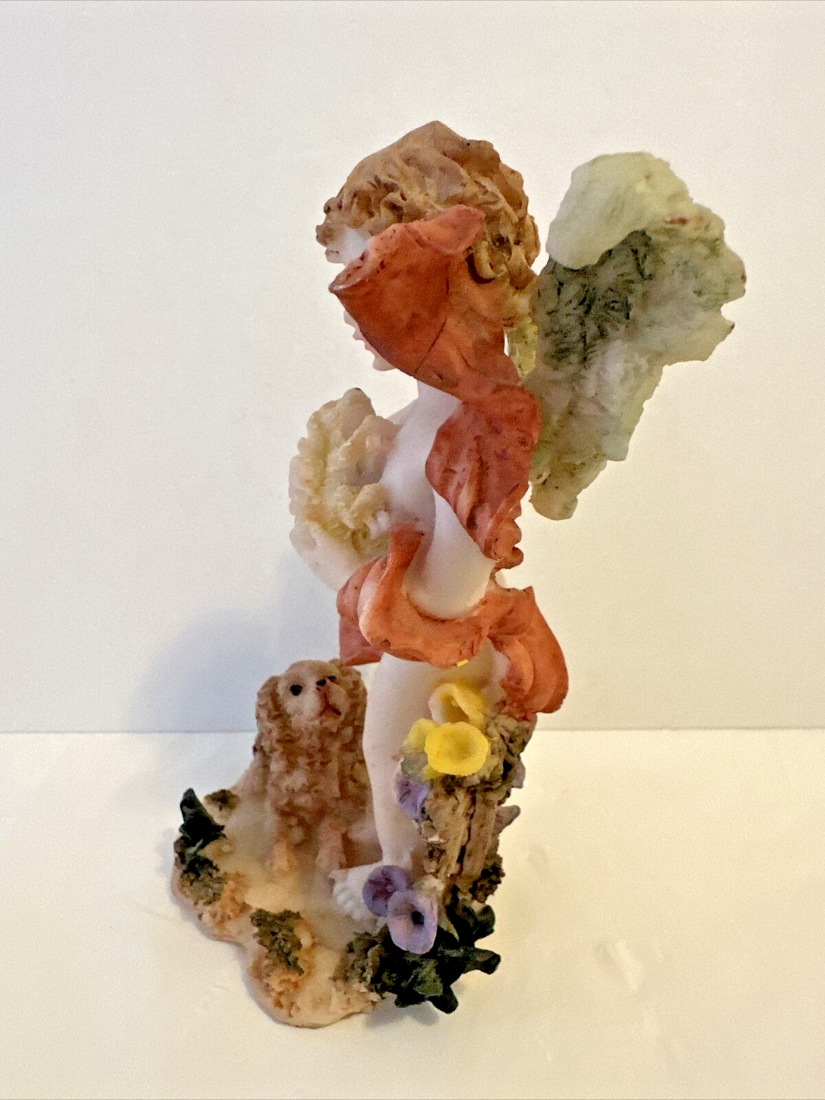 Vintage Cherub Figurine 5.5″ Holding Puppy and Mama Dog At Feet in Floral Garden
