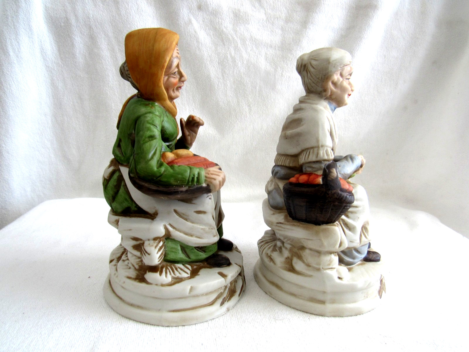 2 Old Women Sitting Holding Vegetable Baskets Figurines