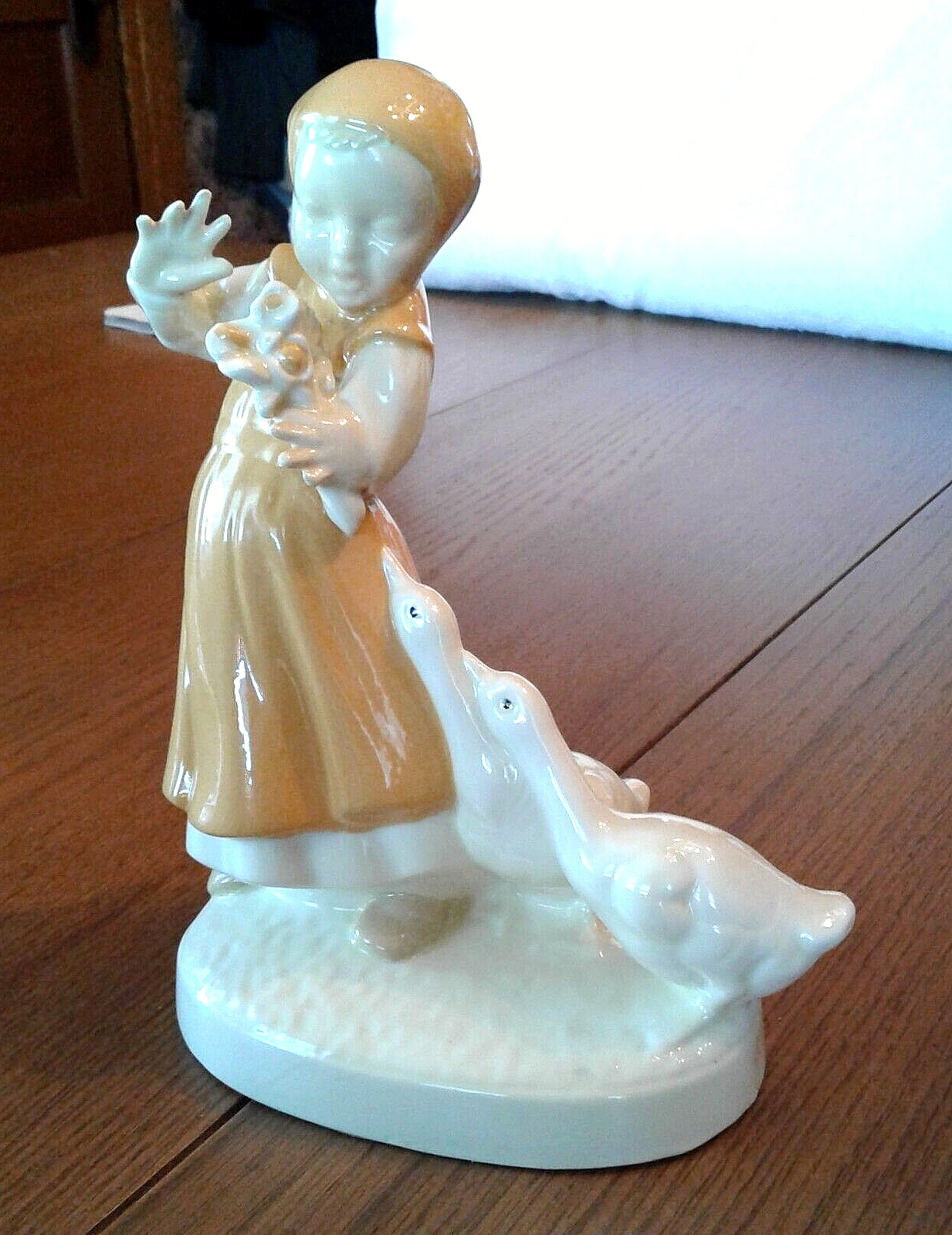 LOVELY GIRL WITH GEESE AND FLOWERS, 9 INCHES TALL & 7 INCHES WIDE FIGURINE