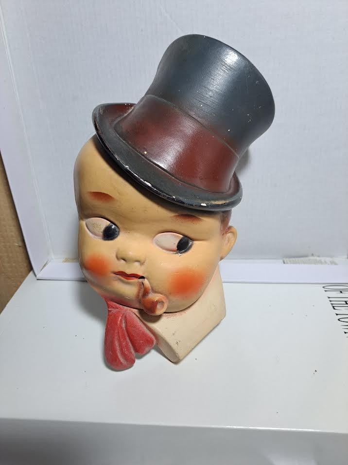 string holder chalkware