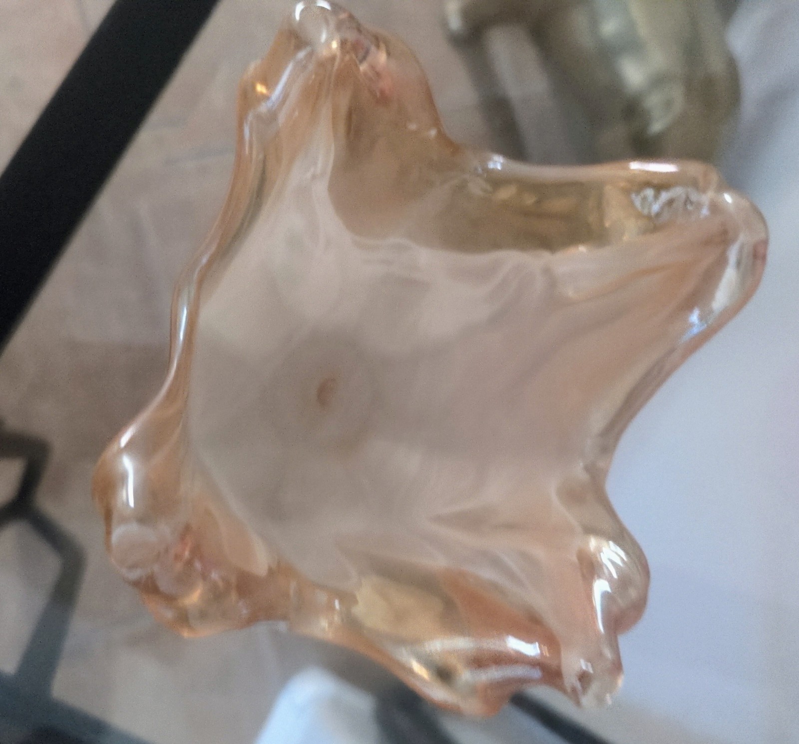 Hand-blown Italian art glass bowl with ruffled rim and iridescent finish. 6″