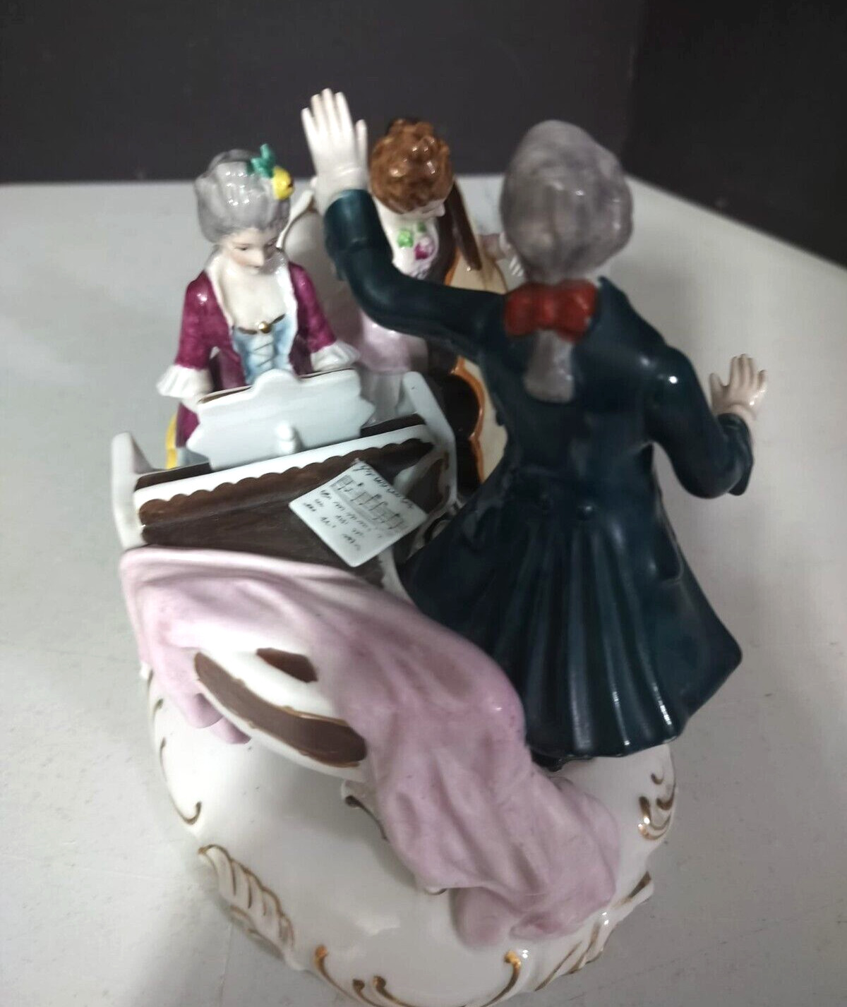 Antique Continental Porcelain Figurine Group, 7″ x 8.5″.