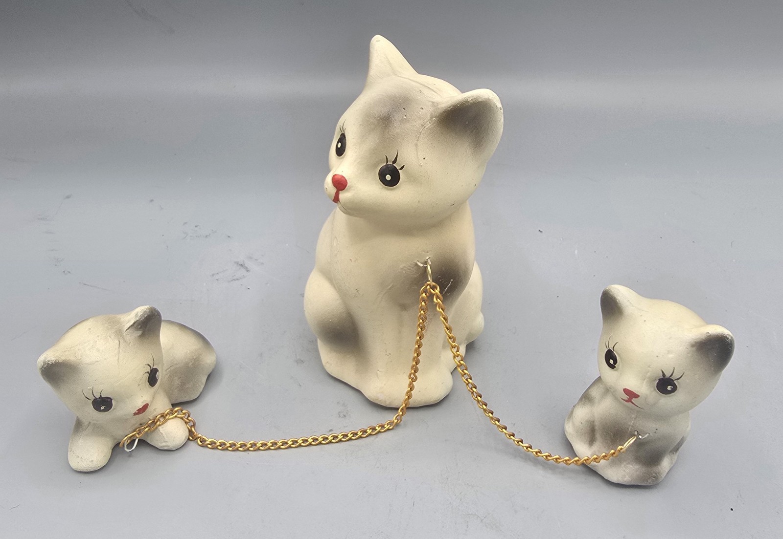 Vintage 1950s Porcelain Chained Dog, Cat, and Deer Family Figurine Sets