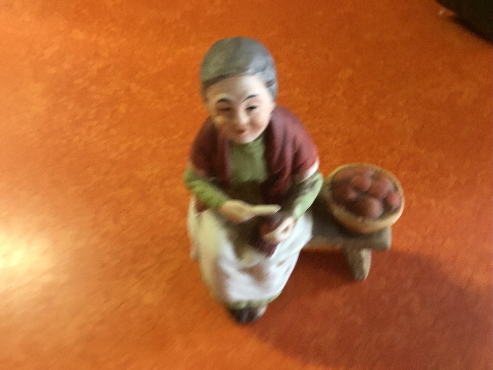 Vintage Figurine Old Lady Woman on Bench Peeling Potatoes