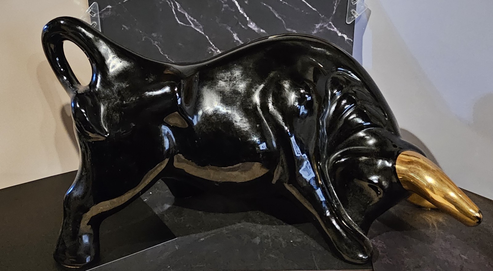 16 inch Black Porcelain bull with brass color horns.