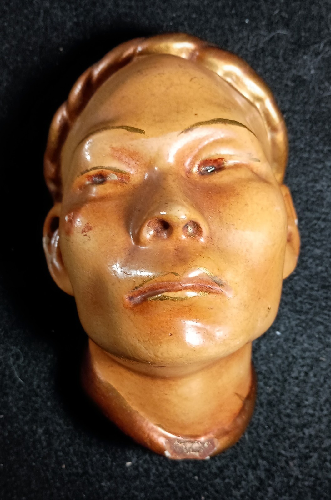 Chalkware Asian Heads pair of wall plaques