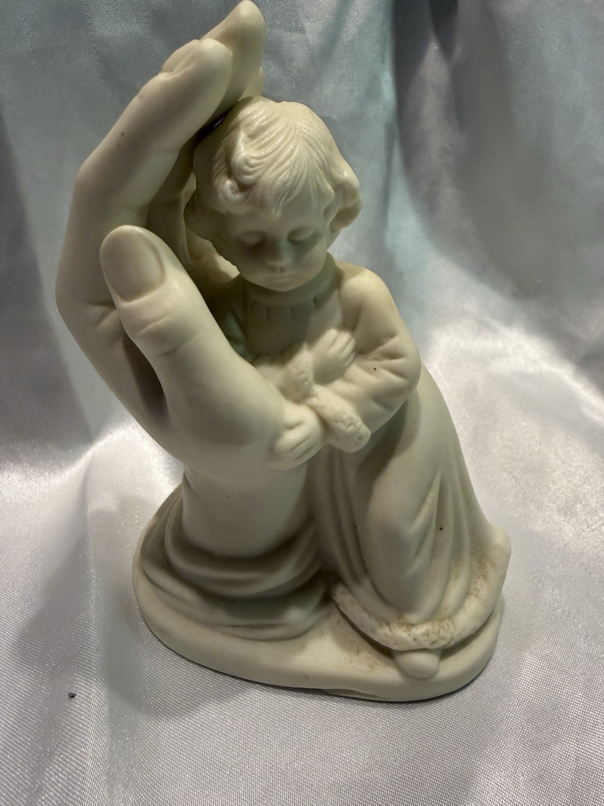White Ceramic Angel Figurines Pair Praying Hands Holding Child 3D Effect