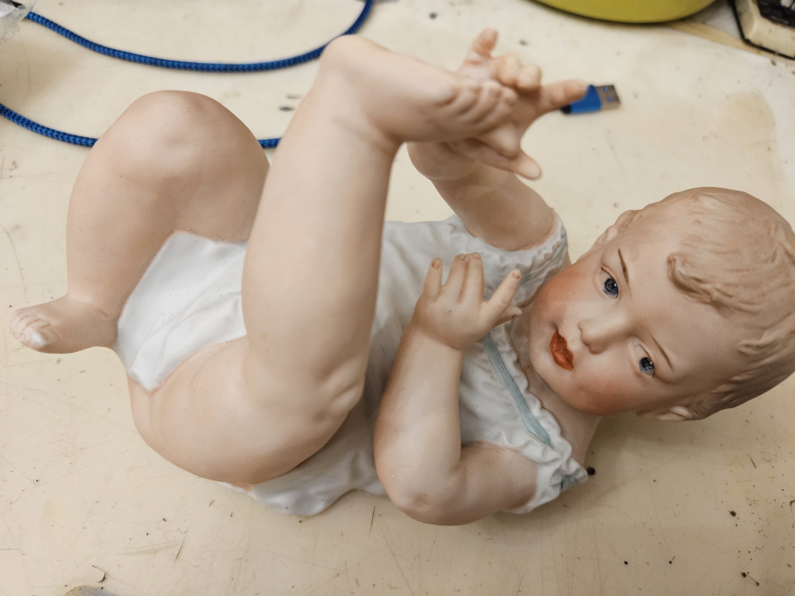 Vintage Gebruder Heubach bisque porcelain piano baby figurine from Germany