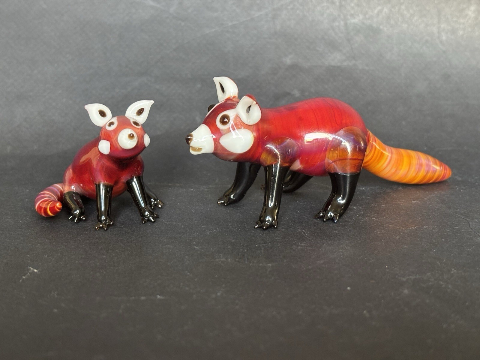 Suellen Fowler Two Glass Red Panda Figurines