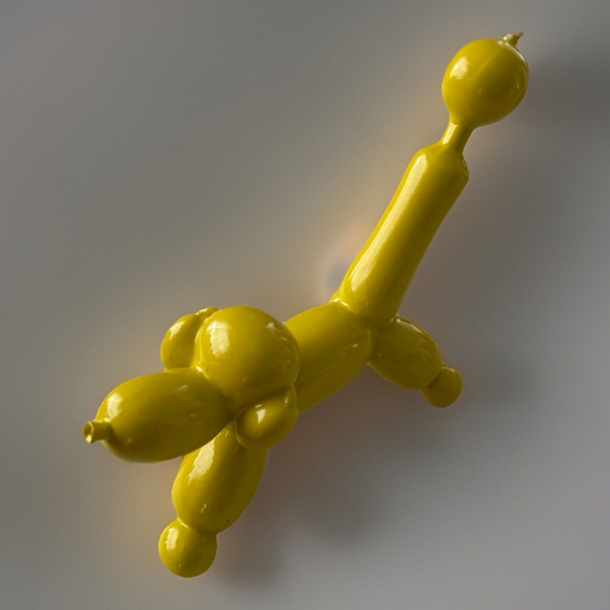 THREE HAND CORP RESIN BALLOON DOG FIGURINE IN ORANGE 6,5”