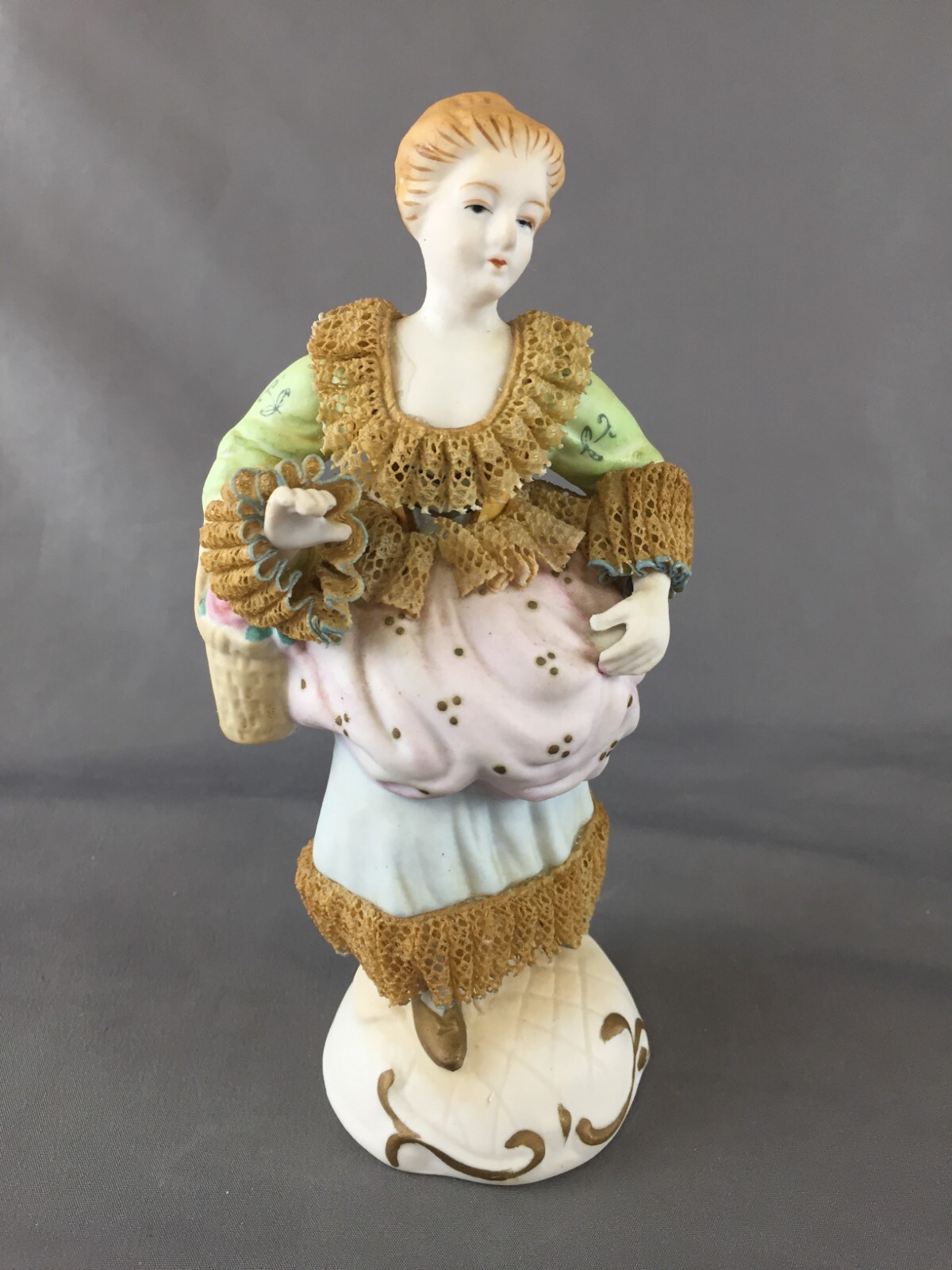 Vintage Occupied Japan Porcelain Figurine of Woman with Starched Fabric Ruffles