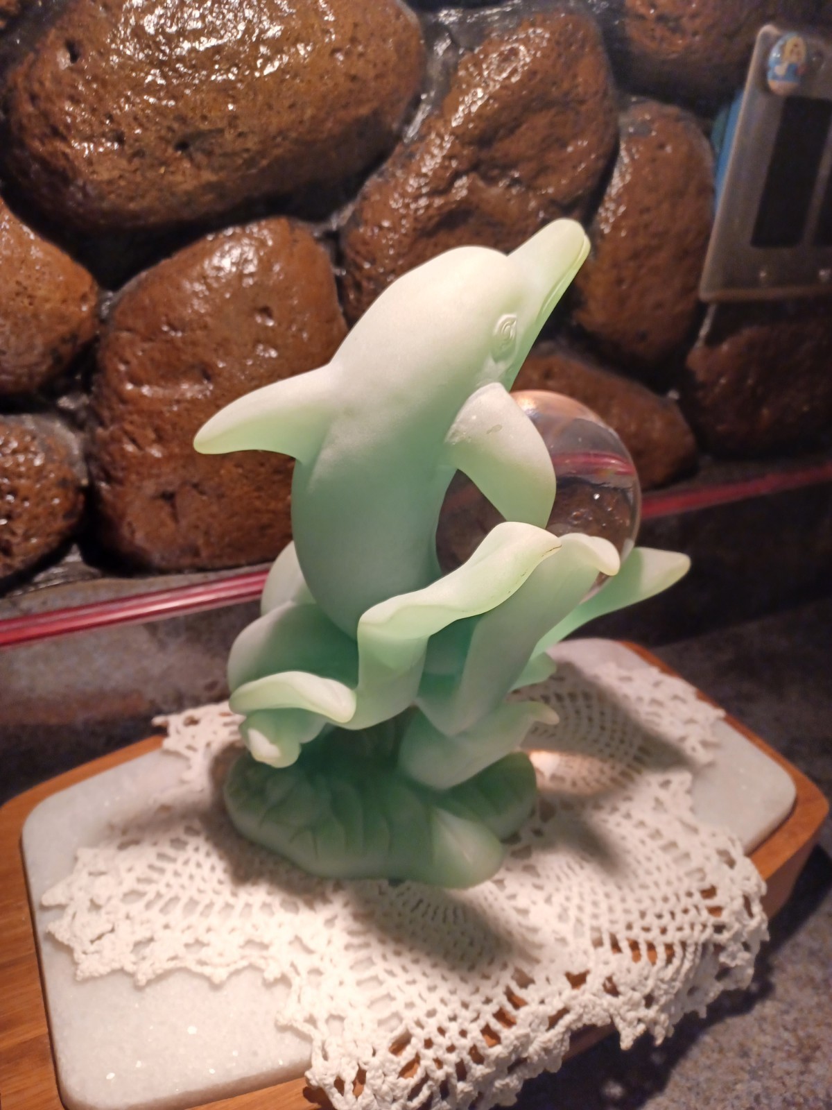 dolphin figurine with crystal ball that glows in the dark