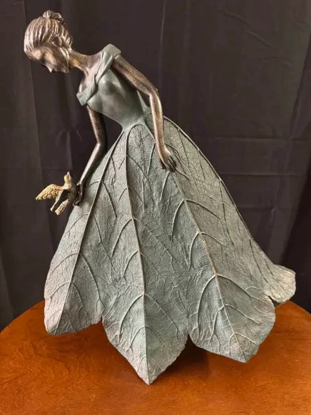 Beautiful Lady holding bird!! Decorative Piece!