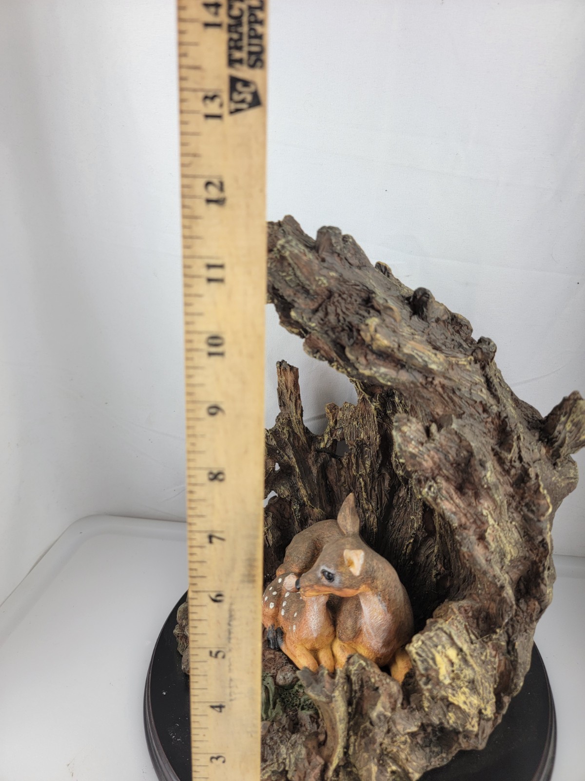 12″ Masterpiece Resin Deer, Fawn Resting Cave/ Tree Trunk Wodeen Base