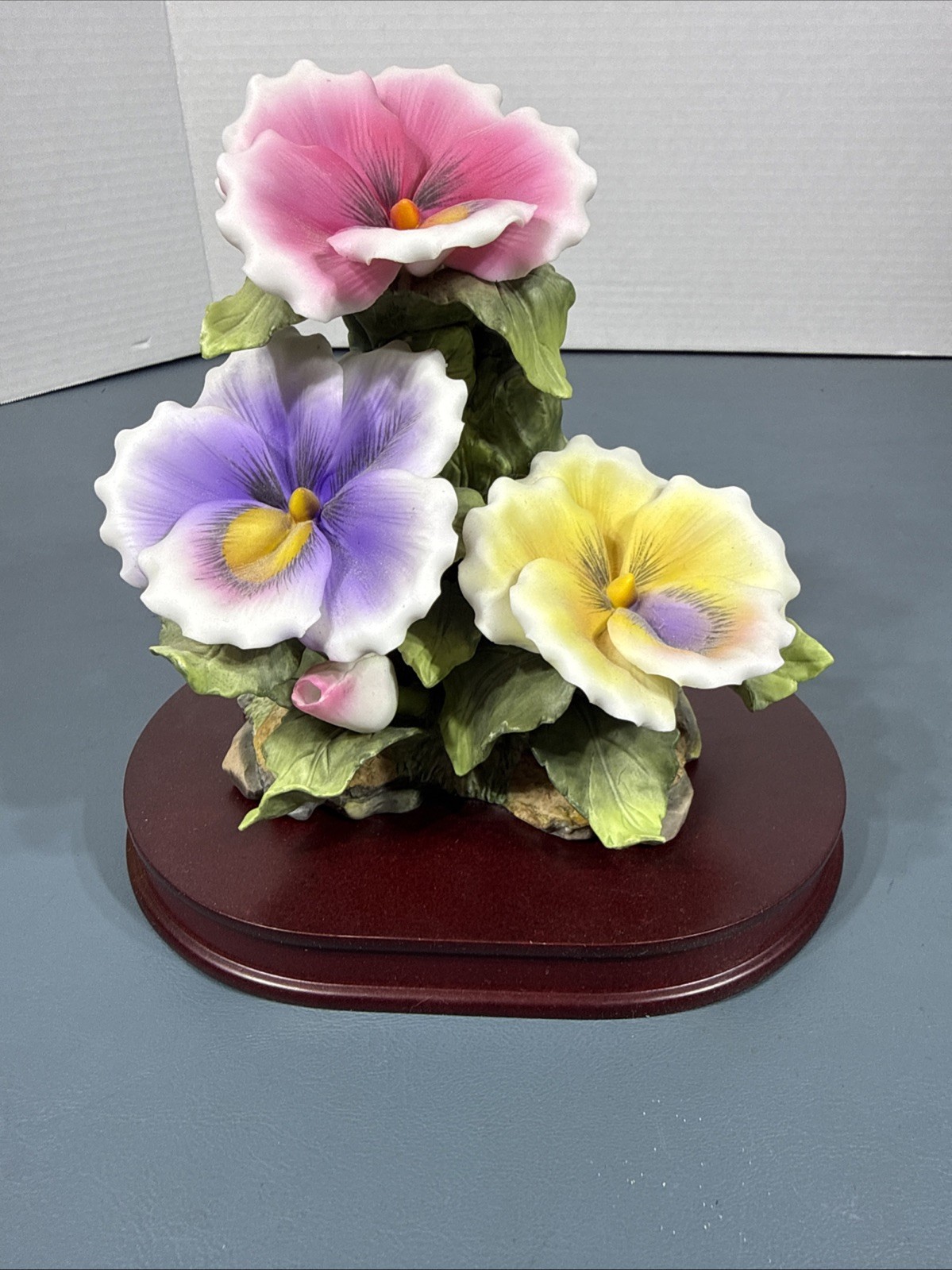 Porcelain Pansy Patch on a Glossy Wood Base