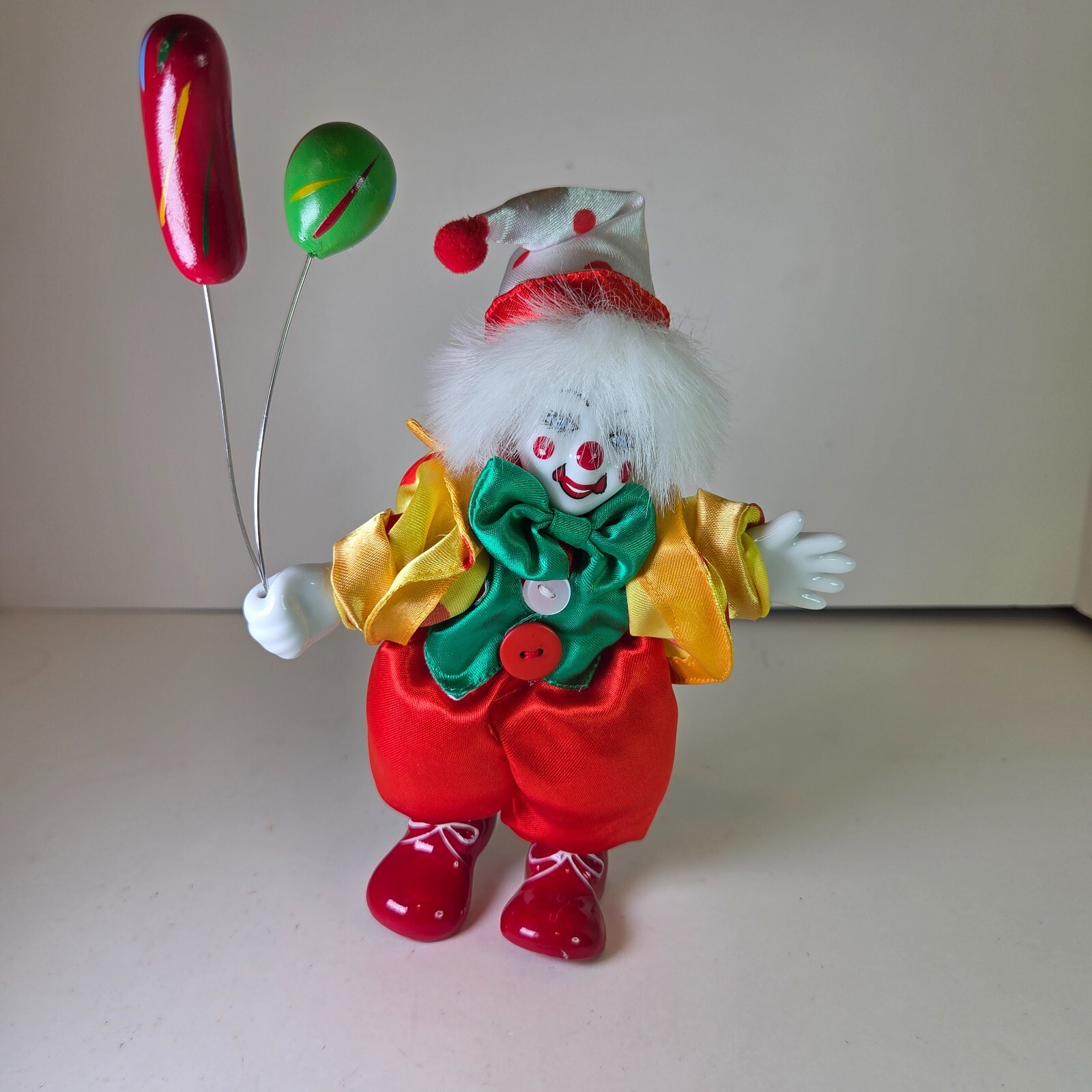 Vintage Porcelain Clown Doll Holding Balloons Fabric Body Red Yellow 7.5″
