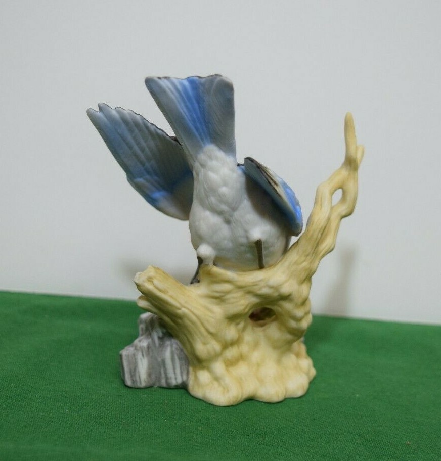 Enesco Blue Bird with flower Mint in its original box. #604828