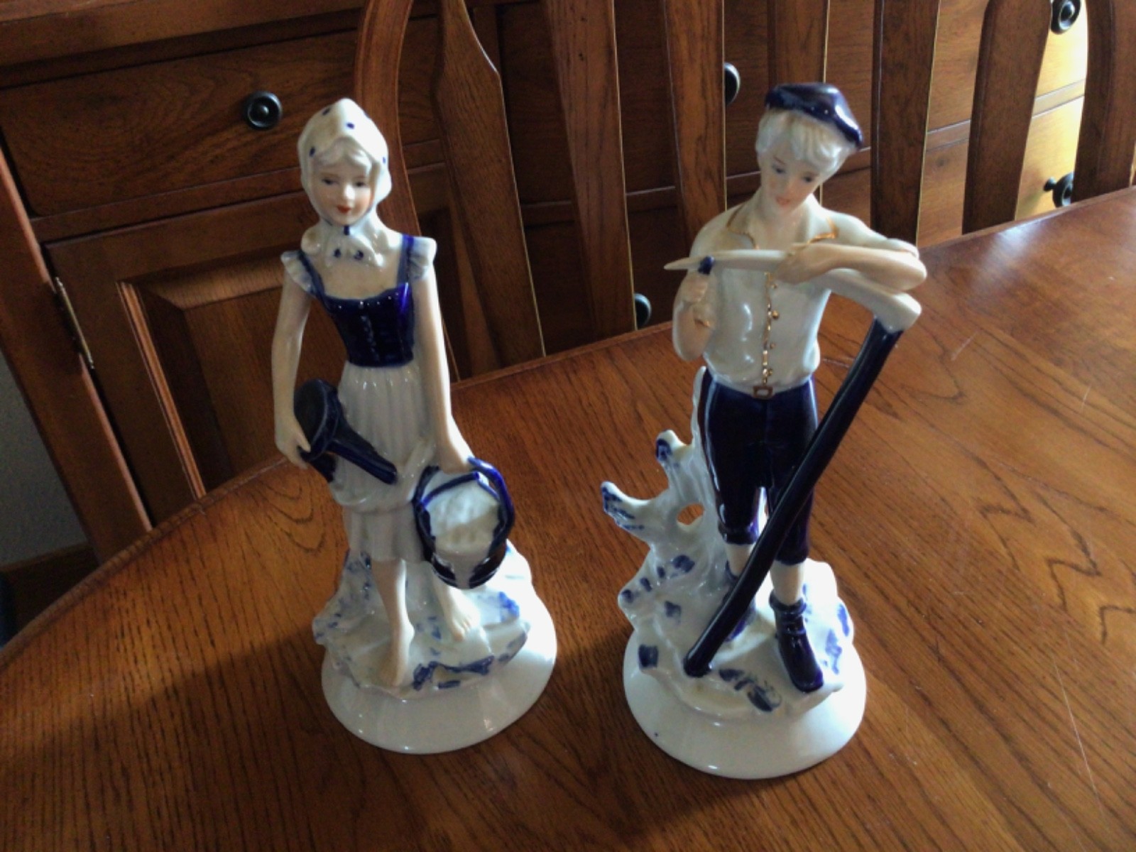 Pair of Vintage Porcelain Figurines Man/Woman with Blue, White & Gold