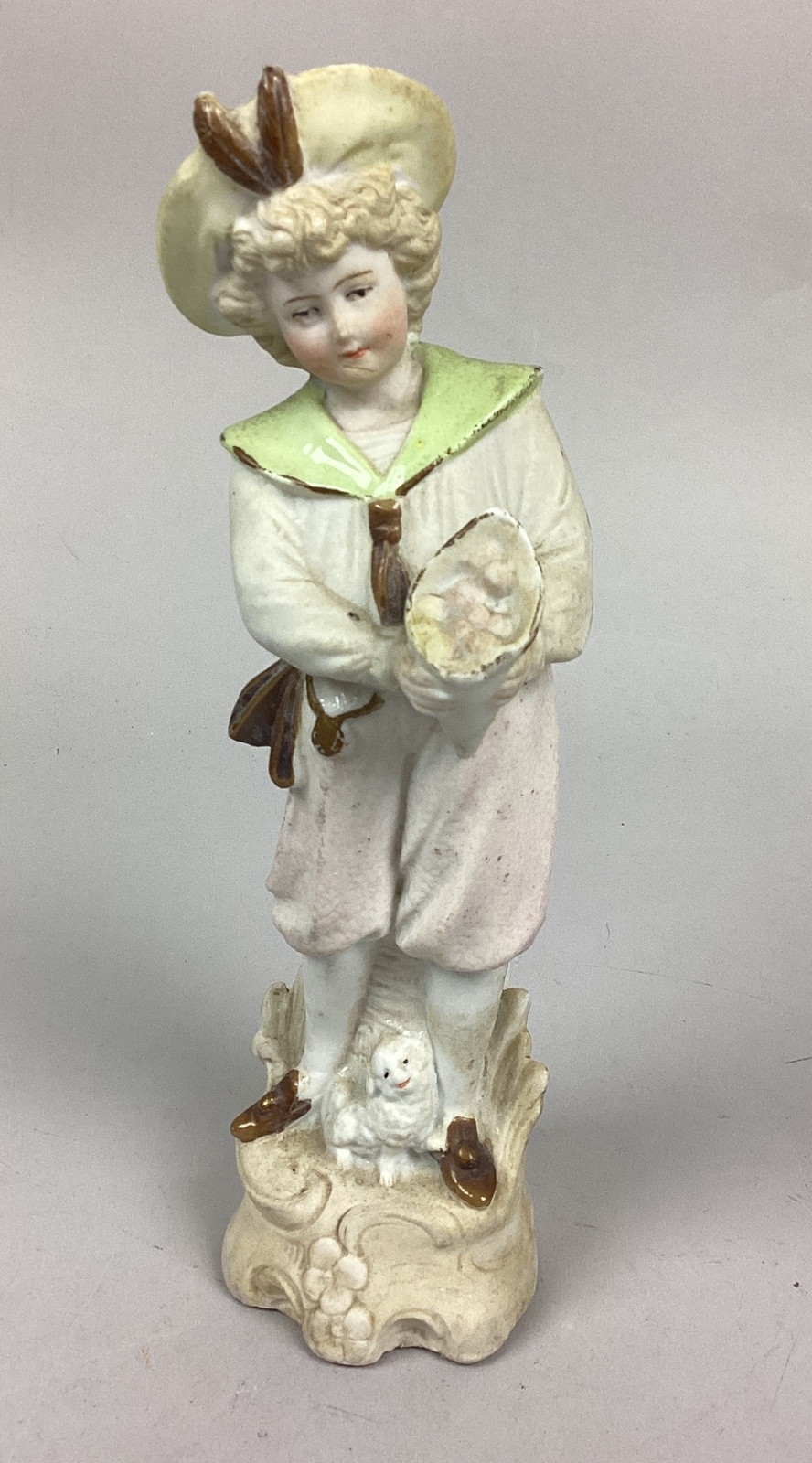 Young Boy With A Dog Offering Flowers Figurine – 9”