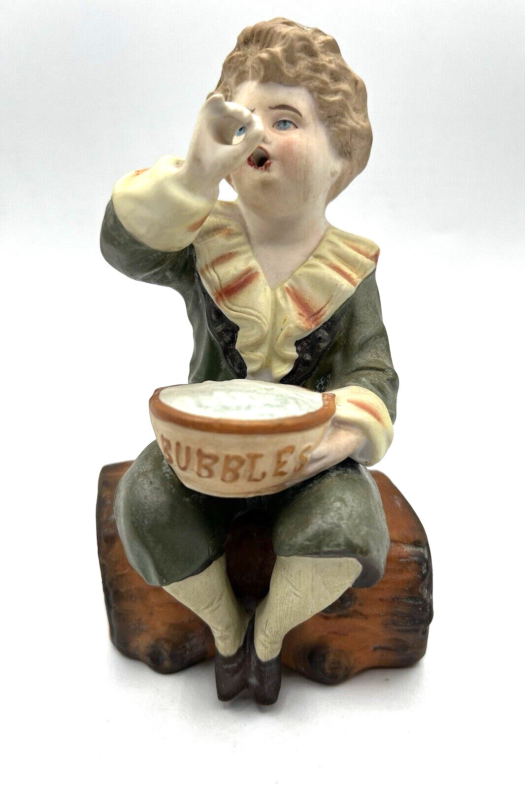 Gebruder Heubach-German Bisque-A Sitting Young Boy Blowing Bubbles 6″