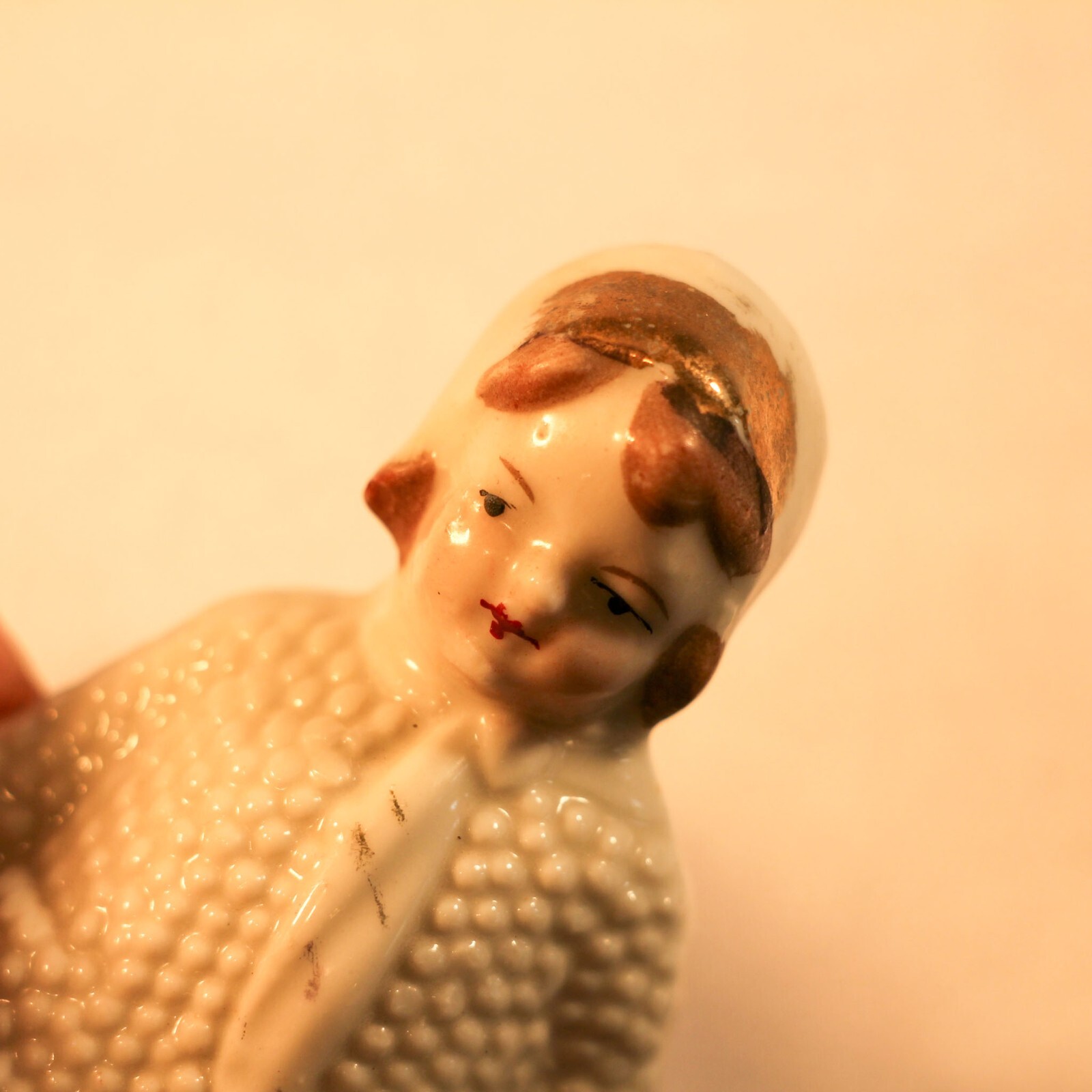 vintage Girl in knit coat porcelain figurine 3.75″ Germany