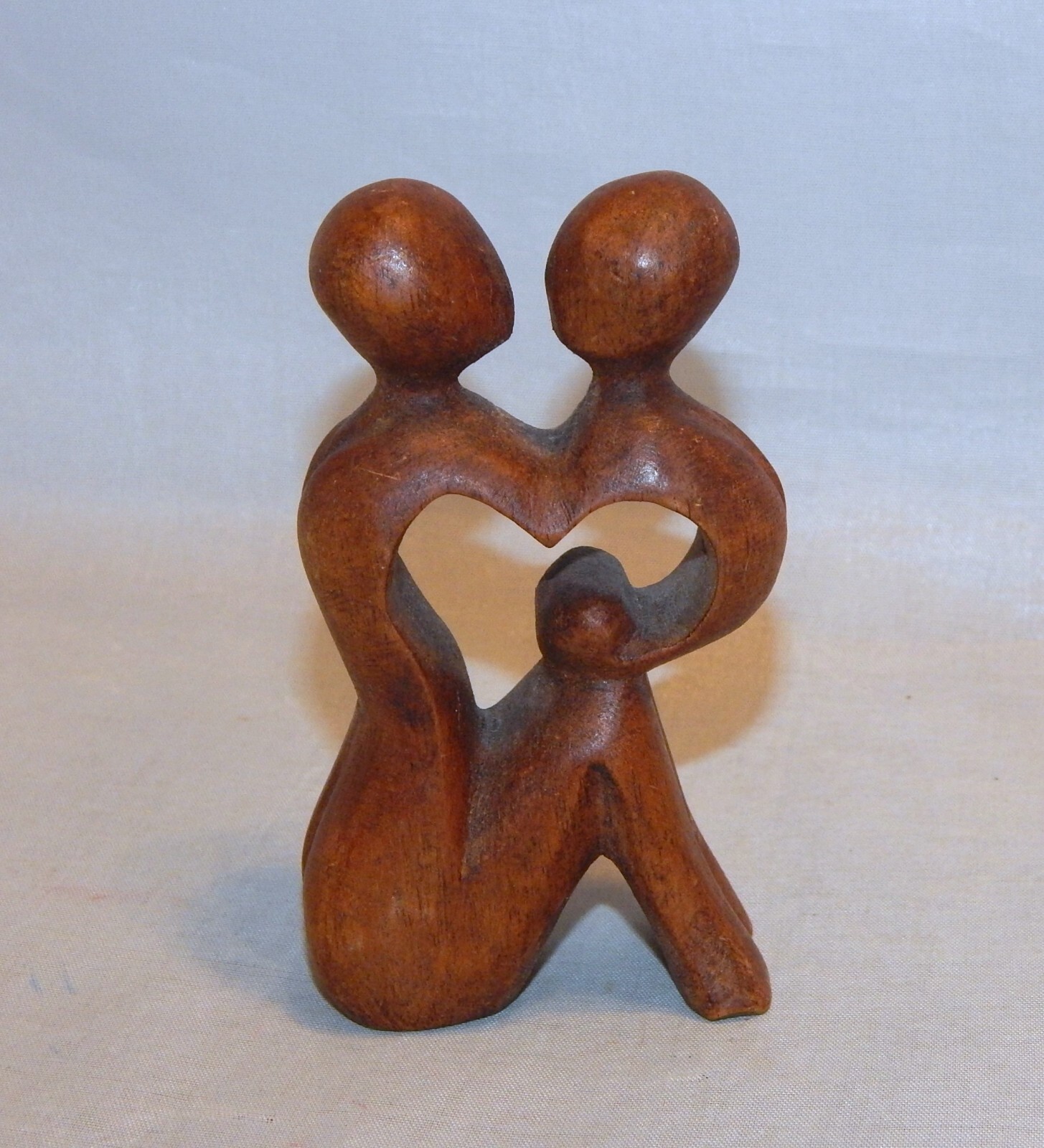 A Heart Shared By Two Wood Carved Figurine