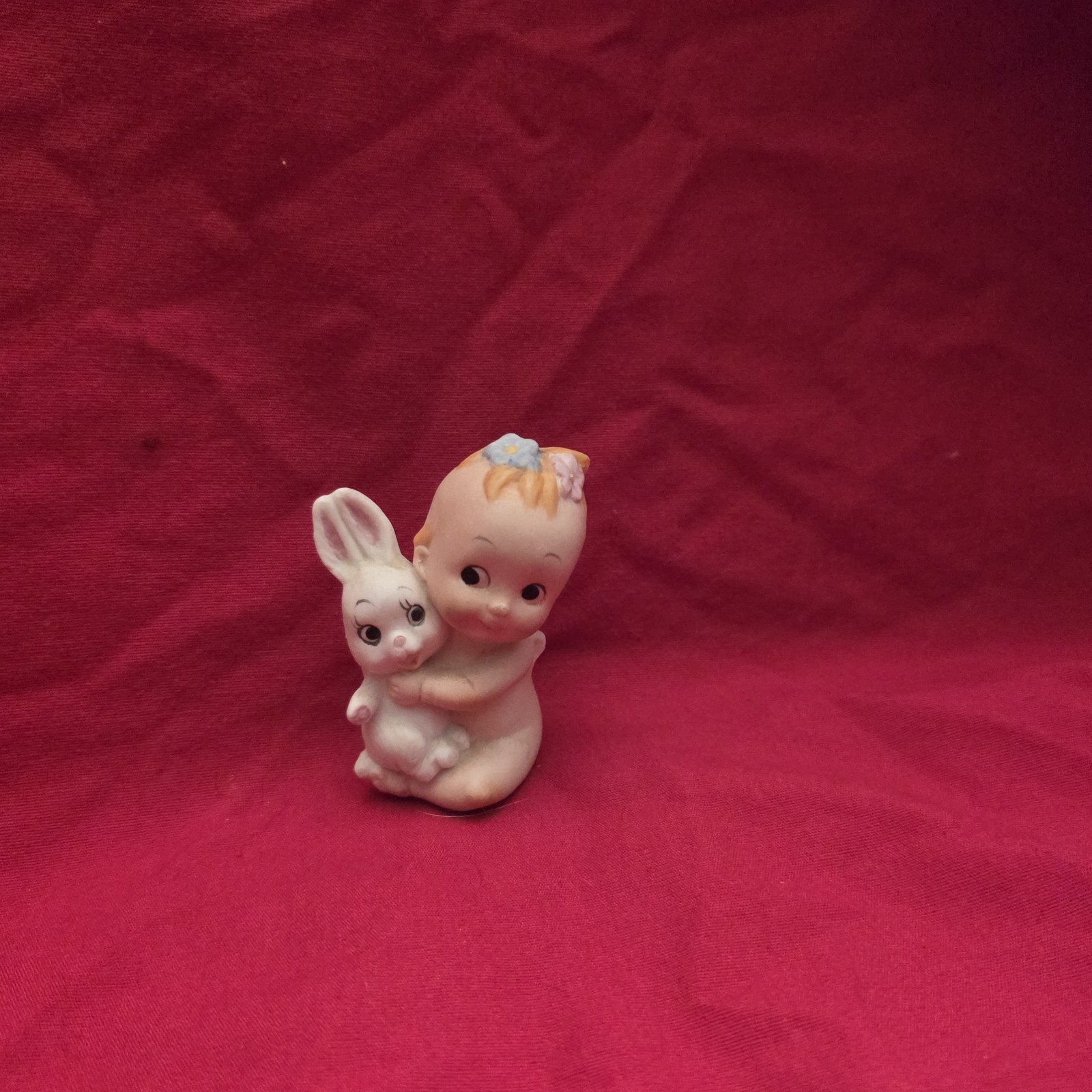 Vintage Enesco Kewpie Baby Bisque Figurine Wings Holding Bunny Rabbit Flower Hai